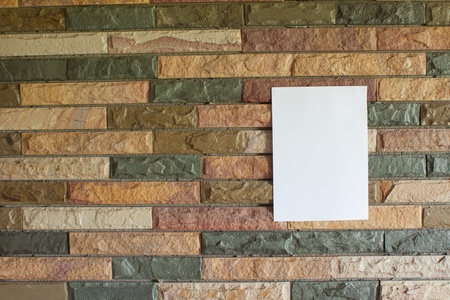 white paper on the wood wallの写真素材