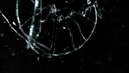 Shattered and broken glass pieces isolated on