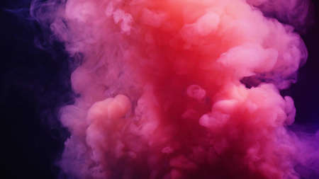 colorful smoke on black background.の写真素材