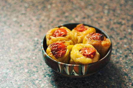 Peppers stuffed with meat rice and vegetables. Closeup