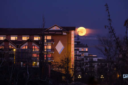 Super Blue Blood Moon rising close to Hotel Caro in Bucharestのeditorial素材