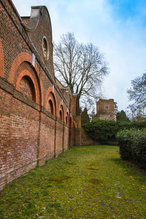 The Stable Block and the tower of the Church of Saint Dunstans in Cranford Park
