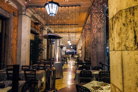 Empty outdoor restaurant in central Rome in a romantic atmosphere.のeditorial素材