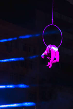 Graceful dancer performing aerial acrobatics. Sonics in Wish performance at Street Theater Festival in Bucharestのeditorial素材