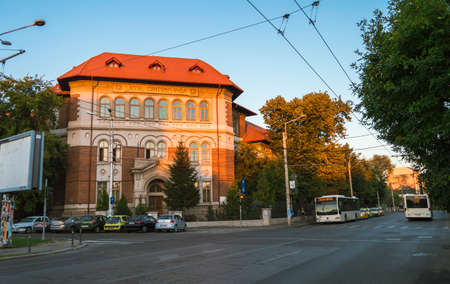 The facade of Cantemir Voda National College in sunset light
