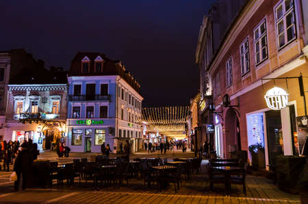 Council Square and Christmas Tree in the old city center of Brasov on a winter night.のeditorial素材
