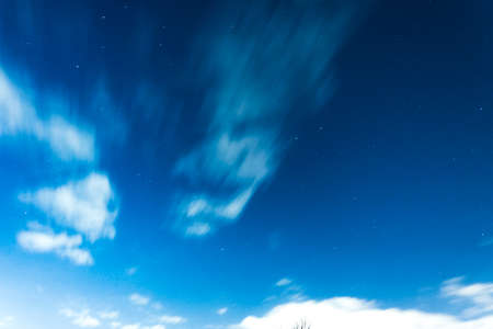 Electric blue night sky with bright stars