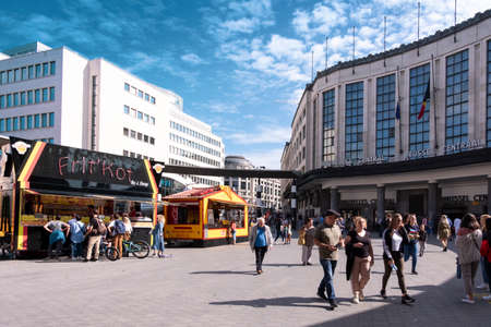 Brussels, Belgium - September 22, 2019: People in front of the entrance of the Central Train Station (Bruxelles-Central / Brussel-Centraal), buying fries or walking around.のeditorial素材