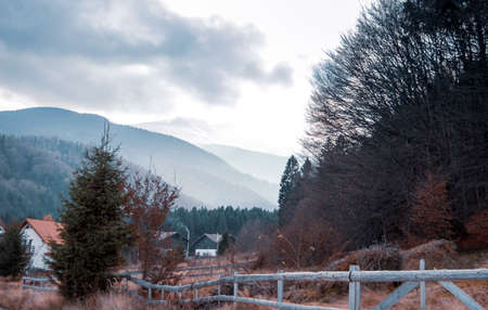 Mountain view in Sambata de Sus on an overcast autumn day.の写真素材