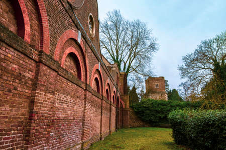The Stable Block and the tower of the Church of Saint Dunstans in Cranford Parkのeditorial素材
