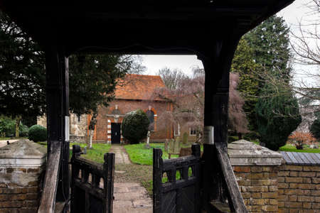 Entrance to St Dunstans Church through a wooden gateのeditorial素材