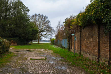 Sign of the Hillingdon Trail near the walls of the Stable Block in Cranford Parkのeditorial素材