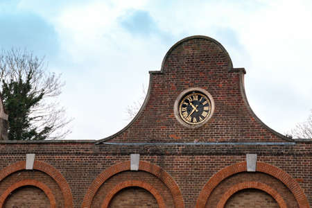 Closeup on the clock on top of the Stable Block in Cranford Parkのeditorial素材