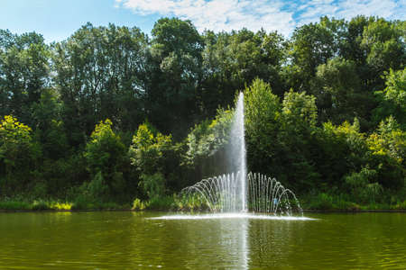 Fountain on Curiacul lake, at the entrance to Campina cityの写真素材