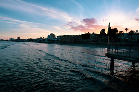 Sunset over the city of Larnaca viewed from the sea