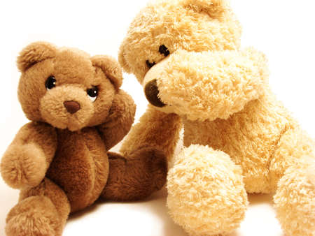   teddy-bear whispering secrets to the other one                               の写真素材