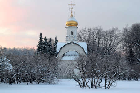 a small russian church at sunsetの写真素材