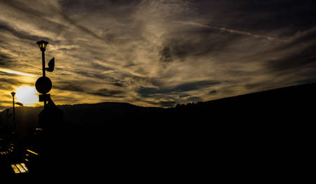 Colored louds in sunset skyの写真素材