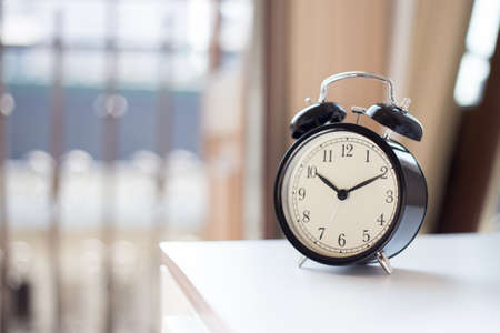 Alarm clock on the nightstad
