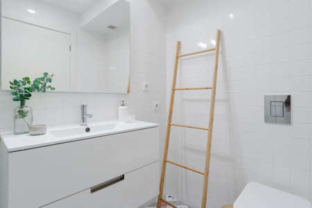 Modern Bathroom With White Tiles