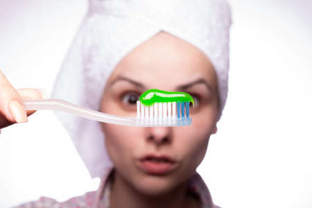 beautiful young woman cleaning teethの写真素材
