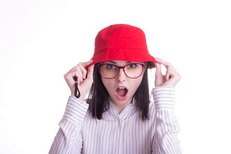brunette in a red panama hat, shirt and glasses, office worker, vacation