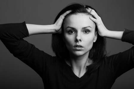 brunette with dark eyes, woman, clean skin, black and white portrait