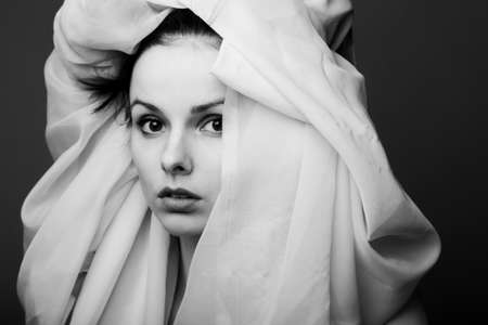 woman with a rococo headdress, black and white photo