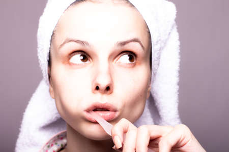 beautiful woman cleaning teeth, toothbrushの写真素材