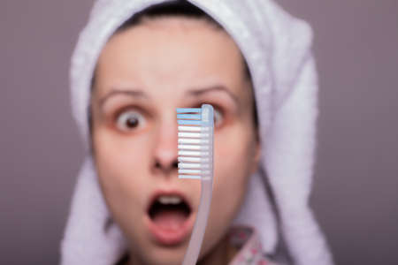 beautiful woman cleaning teeth, toothbrushの写真素材
