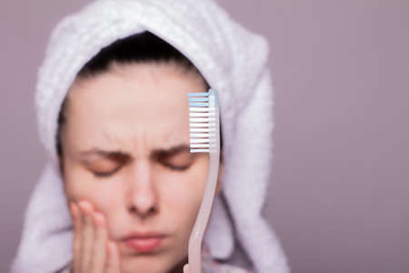 woman brushes teeth, toothache, toothbrushの写真素材