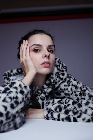 woman in a sweatshirt with a hood, art portrait