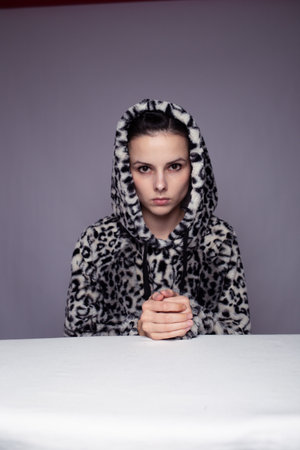 art portrait of woman in hoodieの写真素材