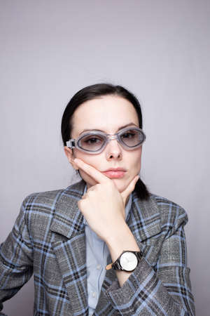 woman office worker wearing glasses for the poolの写真素材