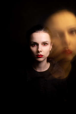 art portrait of a woman with white skin, mixed lightの写真素材