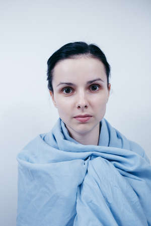 woman in blue, white background