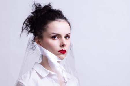 woman with red lips wrapped in plastic wrap. high quality photoの写真素材