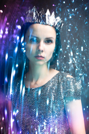 art portrait of a beautiful woman with mixed light. high quality photoの写真素材