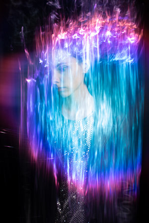 art portrait of a beautiful woman with mixed light. high quality photoの写真素材