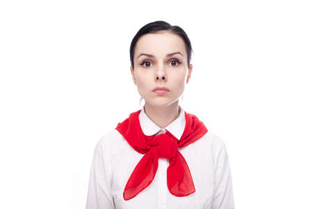 sad woman in a white shirt and a red scarf around her neck. high quality photoの写真素材