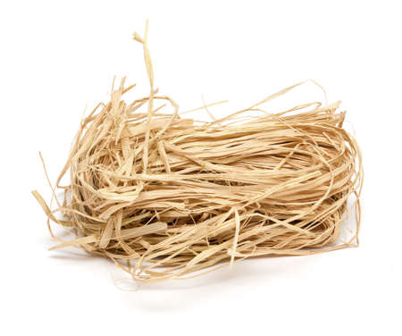 straw for packing and decorating on white backgroundの写真素材