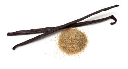vanilla beans and brown vanilla sugar isolated on white background