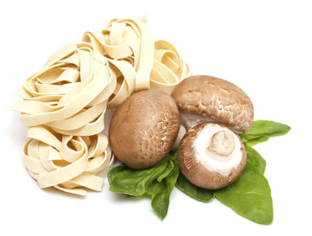 italian pasta fettuccini and mushrooms isolated on whirwの写真素材