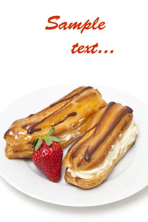 fresh cream puff with whipped cream and strawberry and empty space for your textの写真素材