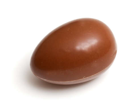 isolated single chocolate eggの写真素材