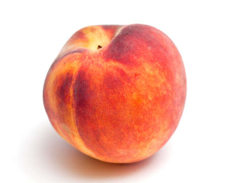 fresh ripe peach isolated on white backgroundの写真素材