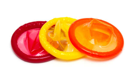 colorful condoms isolated on white backgroundの写真素材