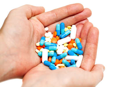 hand with pillsの写真素材