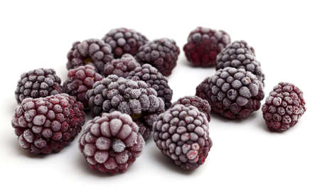 frozen blackberries isolated on white background