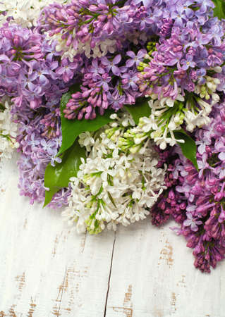 lilac flowers on wooden tableの写真素材